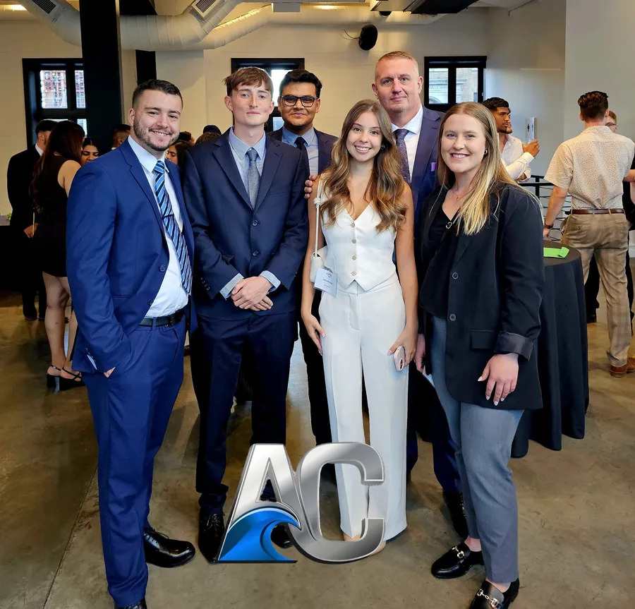 Atlantic Connect team members together at a professional event